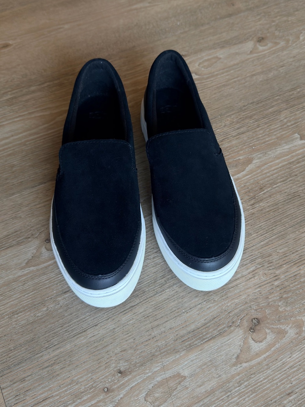 UGG Black Slip-On Suede Flats with White Sole